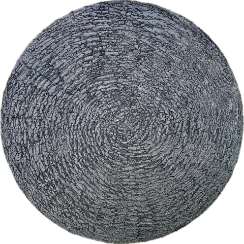 A circular graphite on metal artwork.